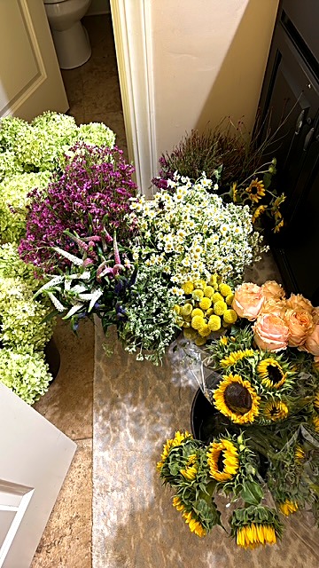 Buckets of fresh-cut flowers