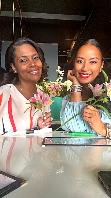 Happy customers with bouquets