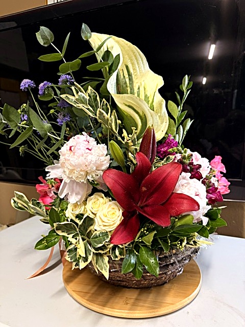Basket with hosta and lily